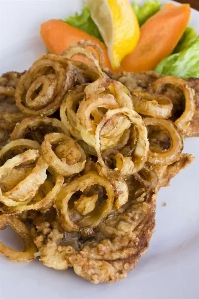 Бифштекс с луком