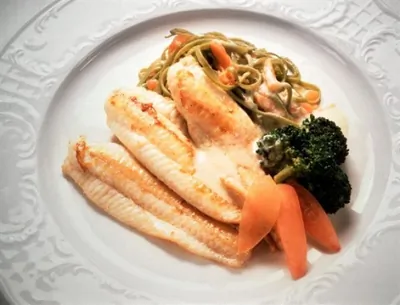 Рыбное филе, тушенное с картофелем по русски