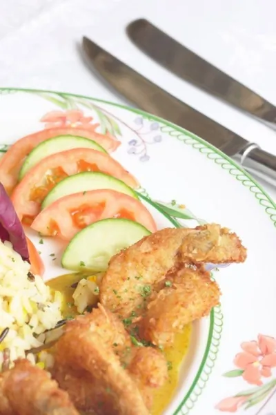 Жареные томатные ломтики в хлебных крошках