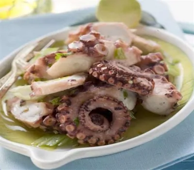 Осьминог с гарниром из поджаренного латука