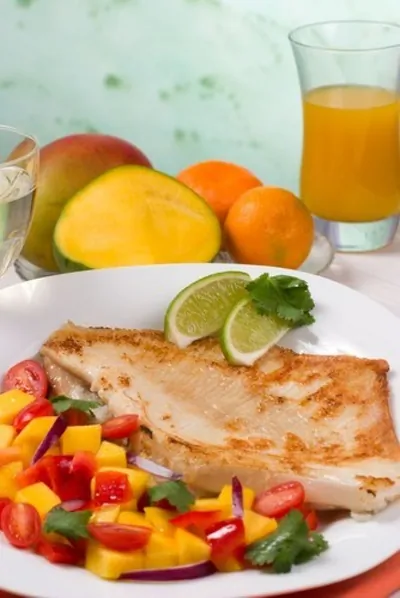 Припущенный скат в цитрусовых соках с имбирем