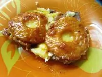 Свинина, запеченная с ананасами и сыром