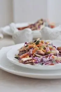 Салат из трех видов капусты с орехами и изюмом