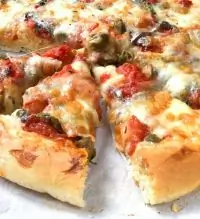 Пицца с ветчиной и шампиньонами