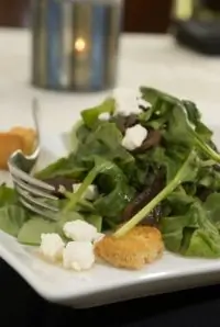 Теплый салат из разноцветного мангольда с кедровыми орешками, чесноком и фетой