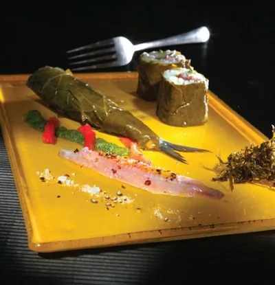 Маринованные сардины с виноградными листьями