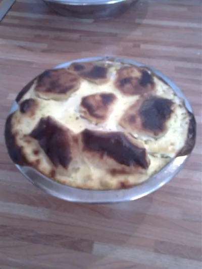 Хек, запеченный с грибами и картофелем