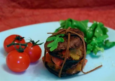 Пикката из телятины с прошутто и обжаренными овощами