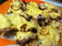 Свинина по французски с сыром и луком