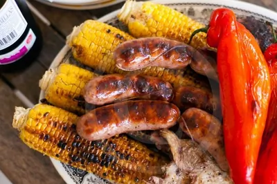 Молодая кукуруза, запеченная на углях, в оливковом масле