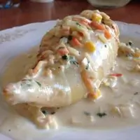 Кальмары, фаршированные овощами с крабовыми палочками