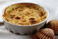 Гребешки и тигровые креветки в соусе бешамель