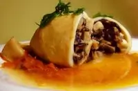 Кальмары. фаршированные грибами