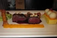 Оленина с брусничным соусом