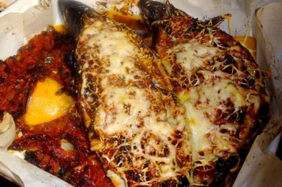 Скумбрия, фаршированная овощами