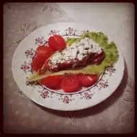 Куриные грудки в пармской ветчине под соусом из сливок и пряных трав