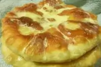 Пышки со сметаной и сахаром