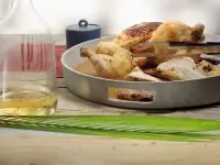 Курица, запеченная с ароматным маслом и мандаринами