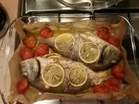 Дорада с травами в бумажном конверте