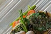 Треска с маслинами и пряными травами по провански