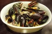 Мидии в сырном соусе