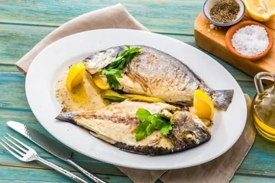 Дорада, маринованная с травами