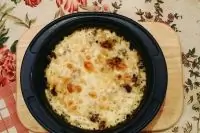 Ароматный горшочек с куриными сердечками