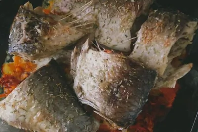 Карп, запеченный под сыром