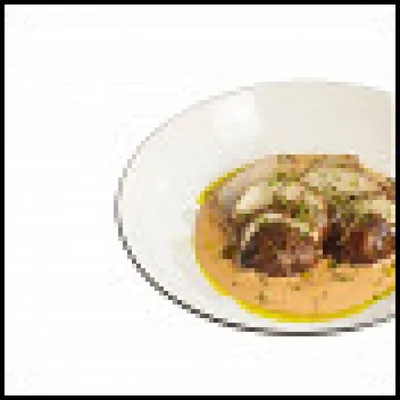 Запеченный топинамбур с луковым соусом