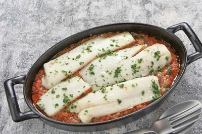 Минтай, запеченный с кабачковой икрой