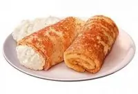 Запеченные блины с творогом и апельсиновым соусом