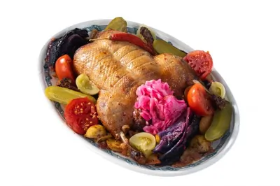 Утка в духовке с апельсинами и медовой глазурью