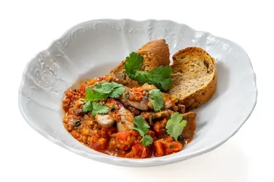 Куриная печень с помидорами