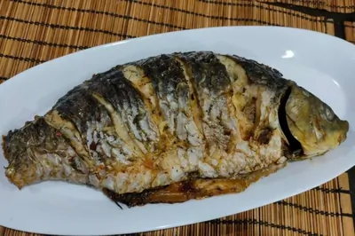 Карп запеченный в духовке