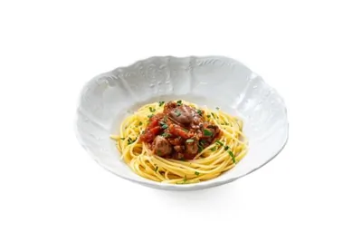 Тушеные куриные сердечки со спагетти